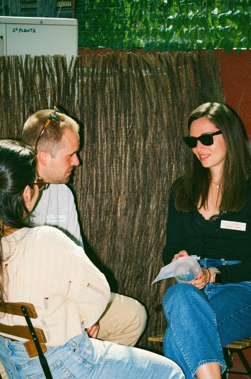 Teammates connecting during a Happy to Gather experience
