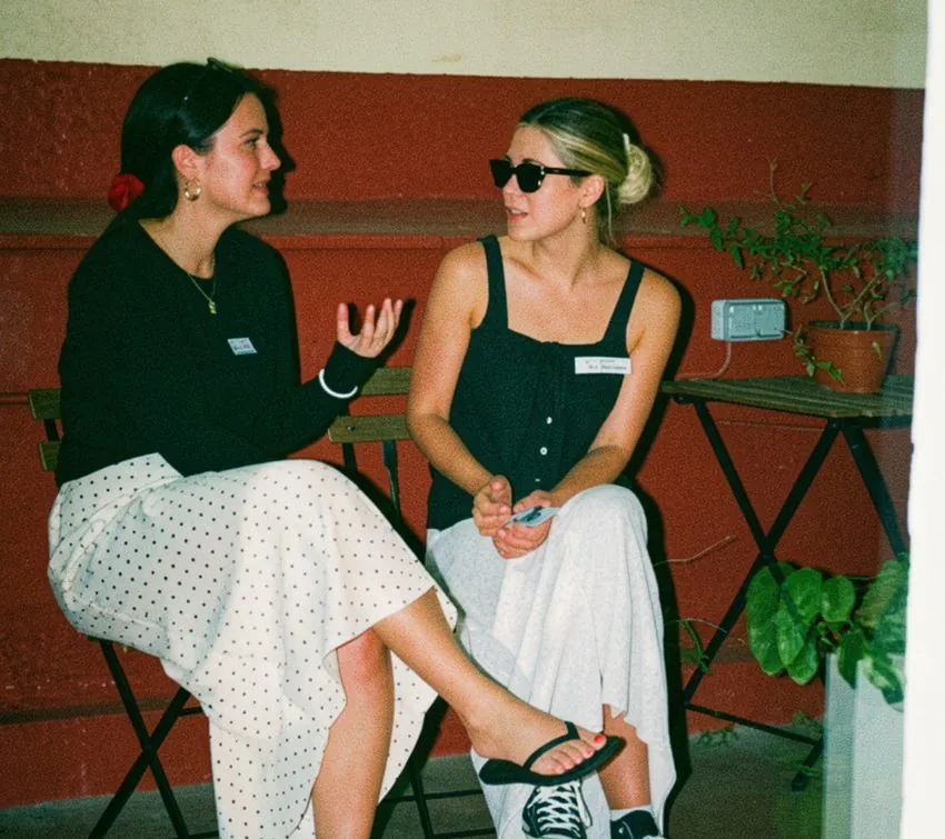Two people sharing a moment of connection at Happy to Gather