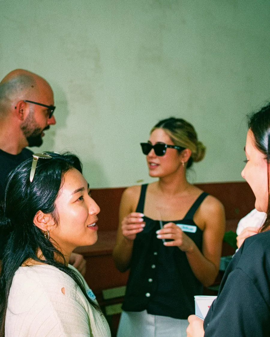 Group having a conversation at a Happy to Gather gathering