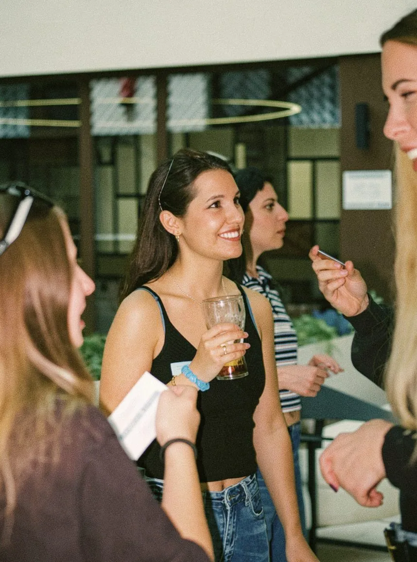 Woman laughing during a Happy to Gather experience