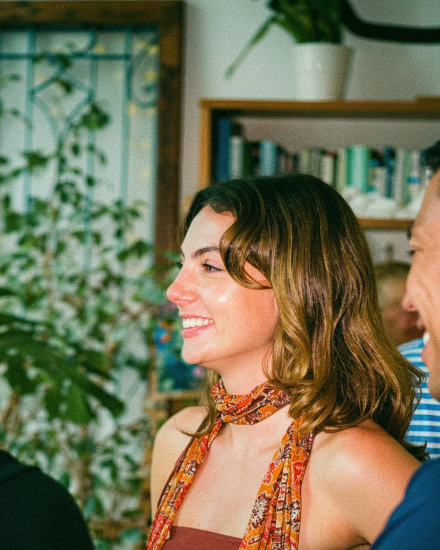 Person smiling during a Happy to Gather experience